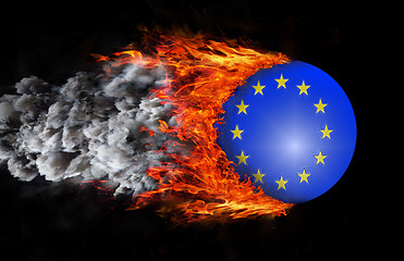 Image showing Flag with a trail of fire and smoke - European Union