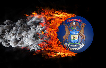 Image showing Flag with a trail of fire and smoke - Michigan