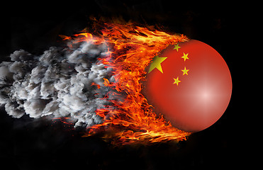 Image showing Flag with a trail of fire and smoke - China