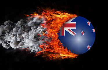 Image showing Flag with a trail of fire and smoke - New Zealand