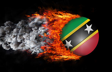 Image showing Flag with a trail of fire and smoke - Saint Kitts and Nevis