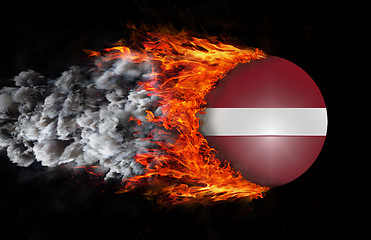 Image showing Flag with a trail of fire and smoke - Latvia