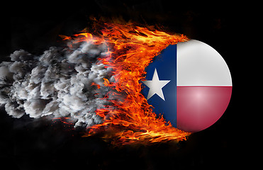 Image showing Flag with a trail of fire and smoke - Texas