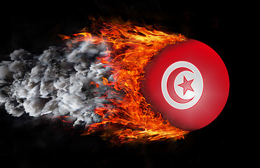 Image showing Flag with a trail of fire and smoke - Tunisia