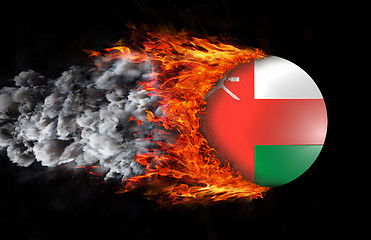 Image showing Flag with a trail of fire and smoke - Oman