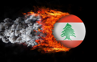 Image showing Flag with a trail of fire and smoke - Lebanon