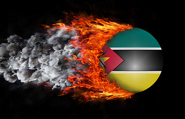 Image showing Flag with a trail of fire and smoke - Mozambique