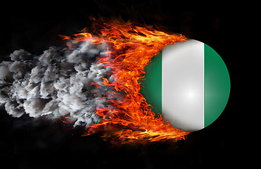 Image showing Flag with a trail of fire and smoke - Nigeria