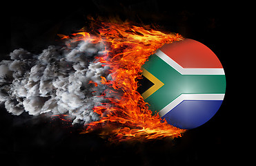 Image showing Flag with a trail of fire and smoke - South Africa