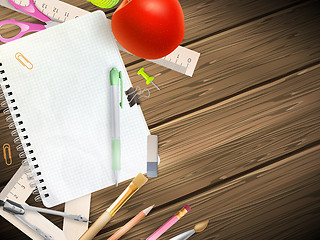 Image showing School supplies on wooden background. EPS 10