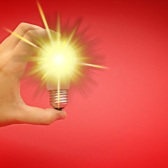 Image showing Background with lit lightbulb