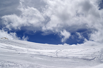 Image showing Ski slope in sun wind day