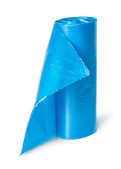 Image showing Vertical roll of blue plastic garbage bags