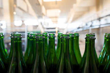 Image showing Many bottles on conveyor belt