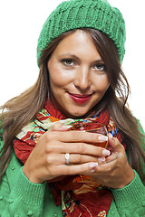 Image showing Attractive woman warming up with a cup of hot tea