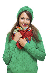 Image showing Cute sexy young woman in a green winter outfit