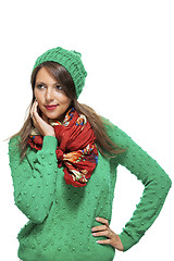 Image showing Cute sexy young woman in a green winter outfit