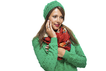 Image showing Cute sexy young woman in a green winter outfit