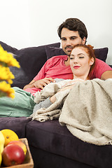 Image showing Couple Resting on the Sofa at the Living Room