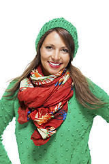 Image showing Cute sexy young woman in a green winter outfit