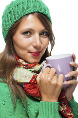 Image showing Pretty Woman in Winter Fashion Drinking Coffee