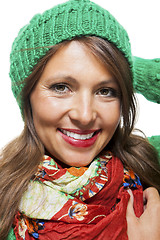 Image showing Cute sexy young woman in a green winter outfit