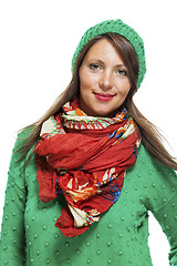 Image showing Cute sexy young woman in a green winter outfit