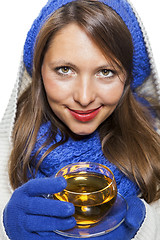 Image showing Fashionable young woman sipping hot tea