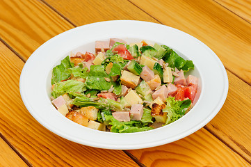 Image showing Salad with cheese, ham and fresh vegetables