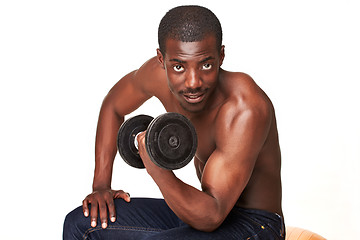 Image showing Strong and muscular guy with dumbbell isolated on white background