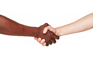 Image showing Black and white human hands in a modern handshake 