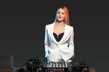 Image showing Beautiful blonde DJ girl on decks - the party,