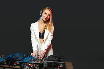 Image showing Beautiful blonde DJ girl on decks - the party,