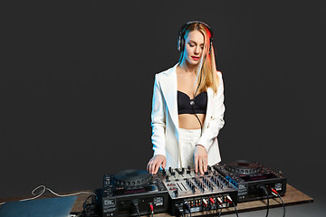 Image showing Beautiful blonde DJ girl on decks - the party,