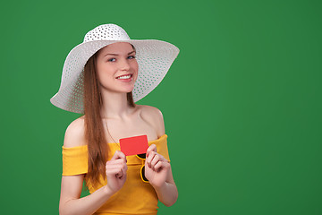 Image showing Summer girl ing blank credit card