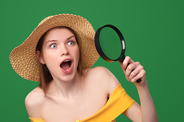 Image showing Shocked surprised woman showing blank copy space