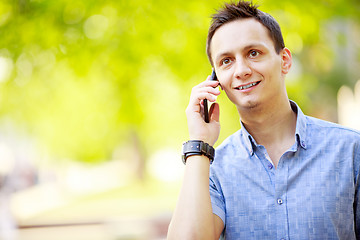 Image showing handsome young man talking on the cell phone