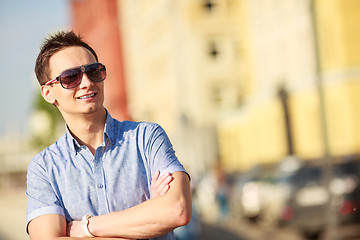 Image showing Portrait of a handsome young man with sunglasses