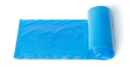 Image showing Roll of blue plastic garbage bags top view