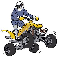 Image showing Rider on the yellow ATV