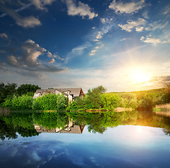 Image showing Sunset over village