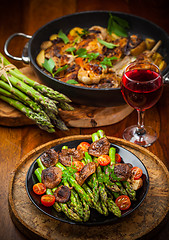 Image showing Green asparagus salad with roasted mushrooms