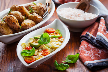 Image showing Cabbage salad with avocado and oven potatoes 