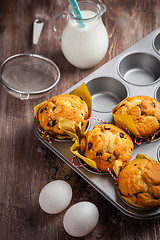 Image showing Homemade muffins with baking ingredients