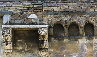 Image showing Old wall with bricks and arches