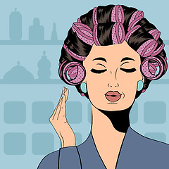 Image showing Woman with curlers in their hair