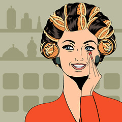 Image showing Woman with curlers in their hair