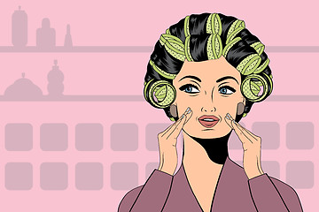 Image showing Woman with curlers in their hair