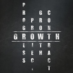 Image showing Finance concept: word Growth in solving Crossword Puzzle