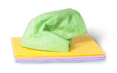 Image showing Multicolored cleaning cloths crumpled on top